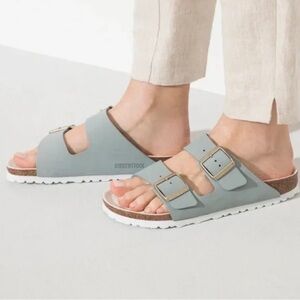 Birkenstock- Arizona BS in Sky Blue with Gold buckle. Size 7